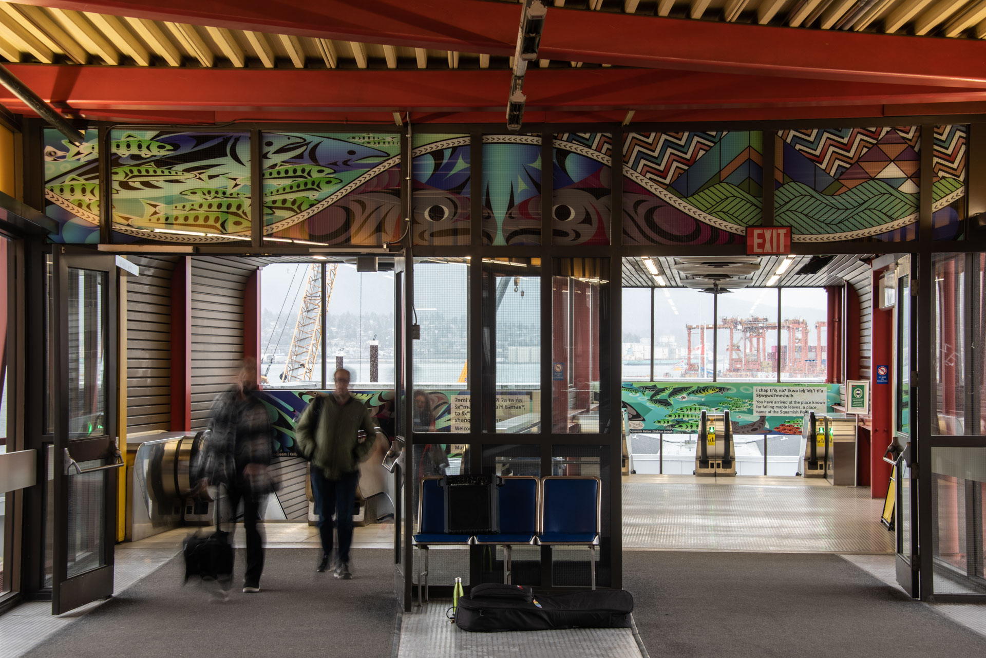 The art above the doors to the escalators to the SeaBus terminal at Waterfront Station