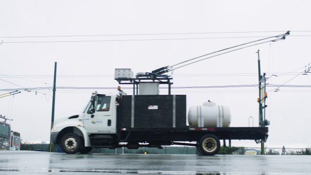 The trolley wire de-icing truck operating at Vancouver Transit Centre