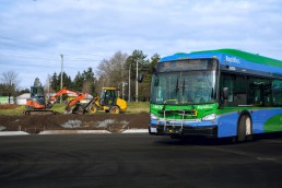 A RapidBus displaying R6 Scott Road parked near construction site