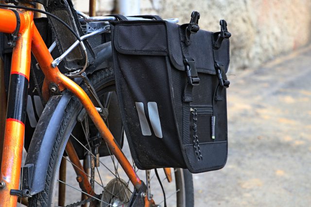 A bike with a rear rack, panniers attached on both sides