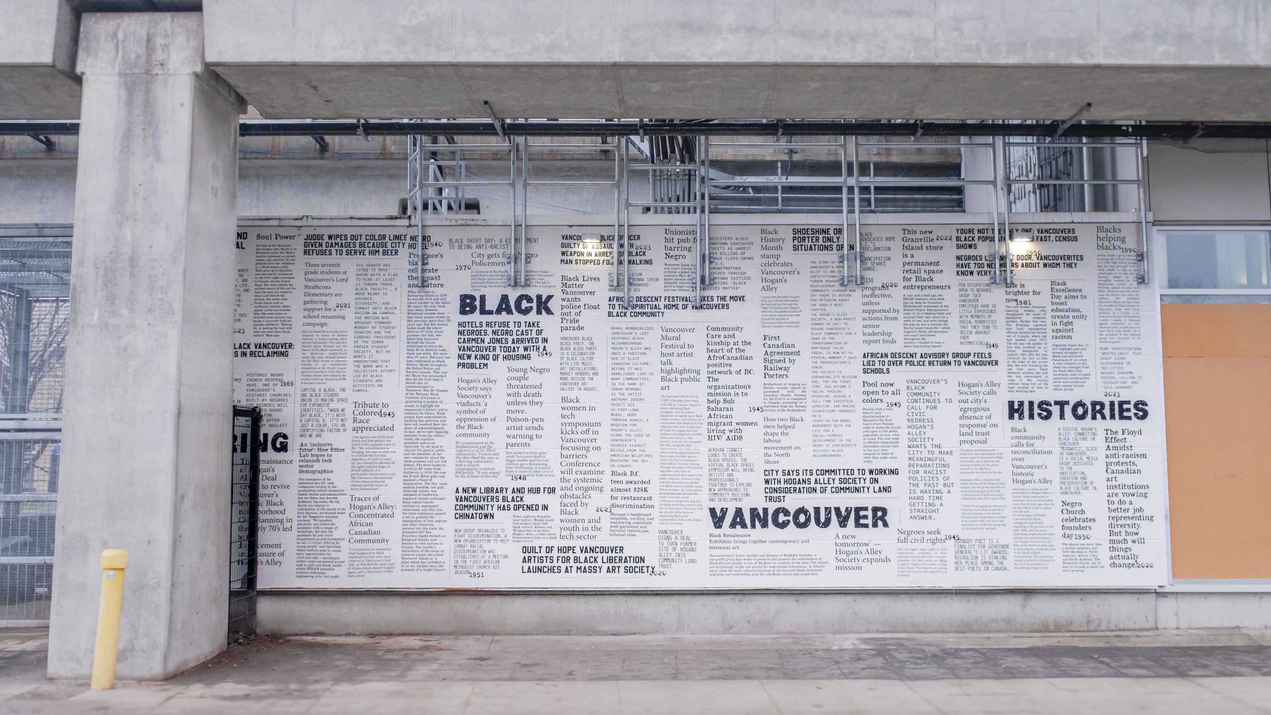 Artwork 'History in Perpetual Motion' by Nya Lewis wraps a wall at Main Street–Science World.