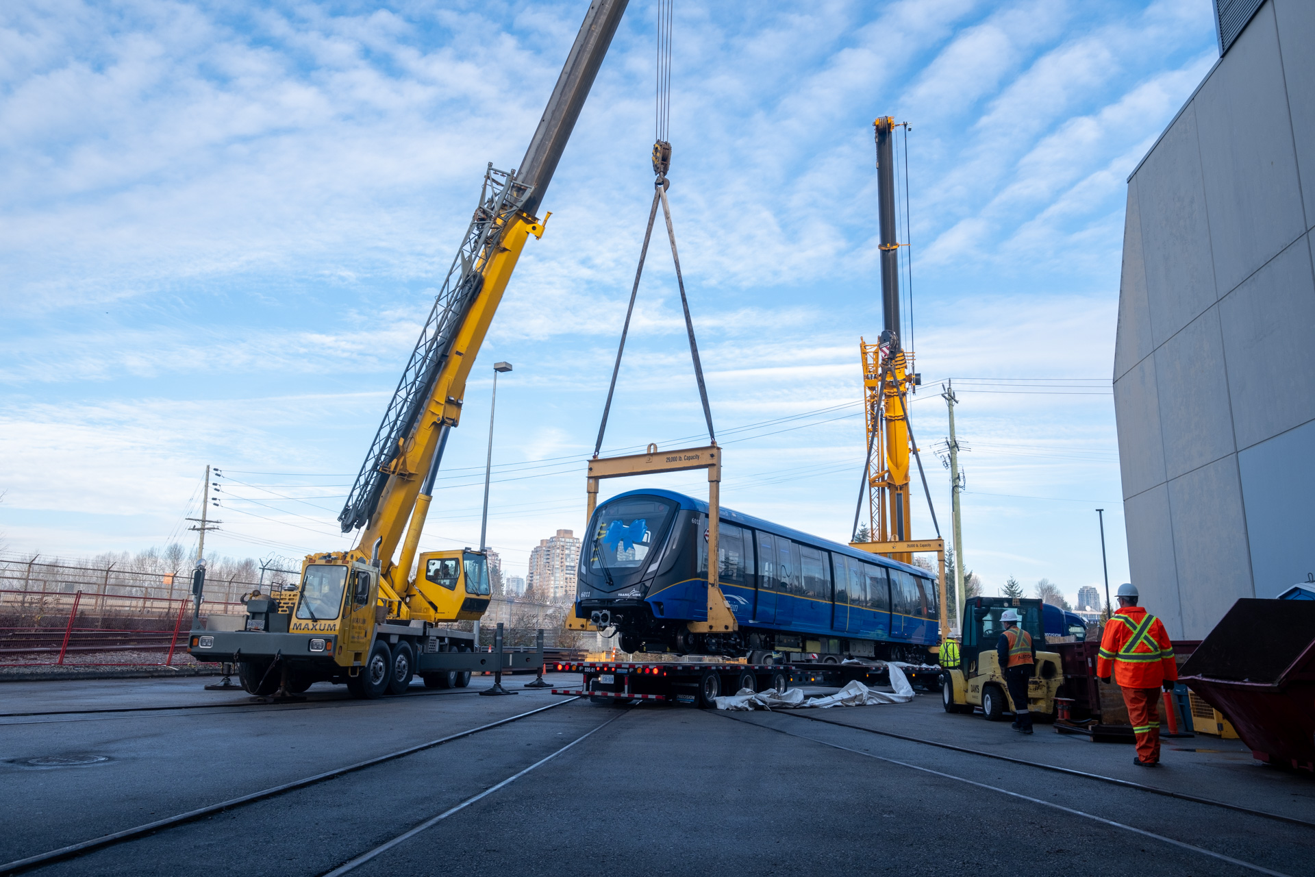 The Mark V SkyTrain unloaded by two cranes