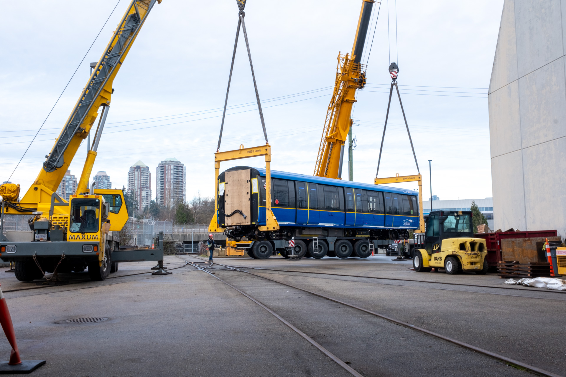 The Mark V SkyTrain unloaded by two cranes