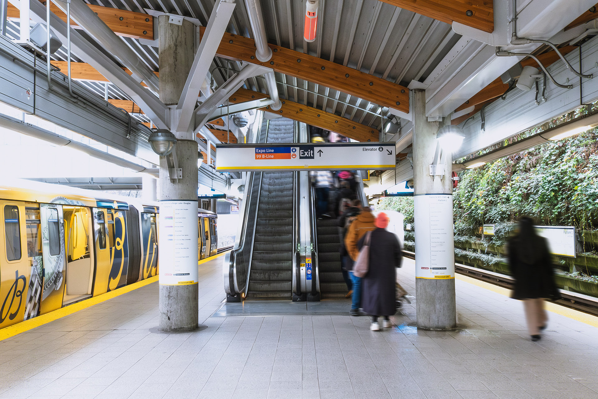 View of escalators from ground level at Commercial–Broadway Millennium Line Station
