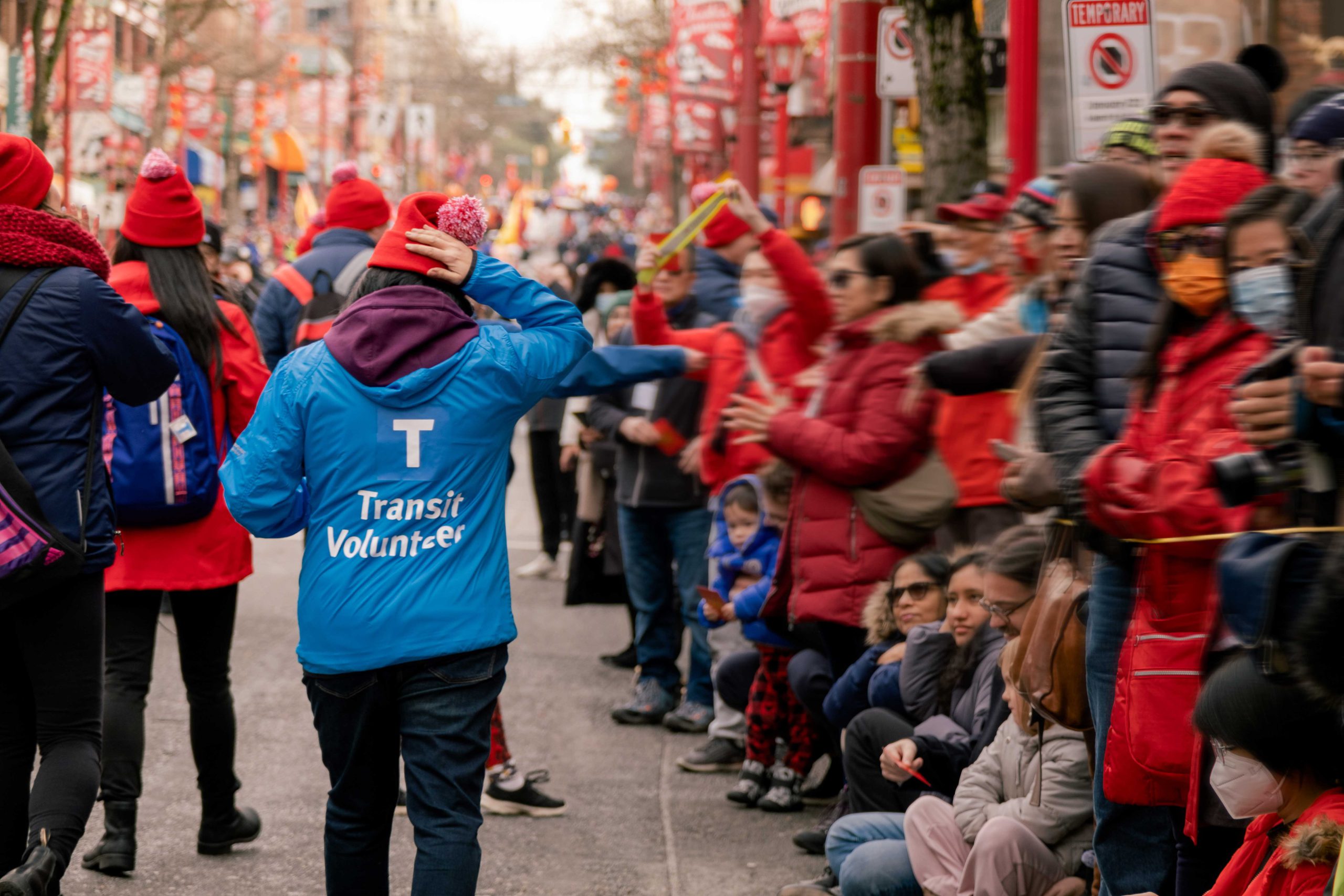 Transit Volunteer walking at the Vancouver Chinatown Lunar New Year Parade