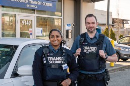 A portrait of two Transit Security officers