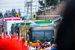 Two buses in the Surrey Vaisakhi Parade in 2023