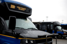 Community Shuttle bus displaying route 338 East Fraser Heights