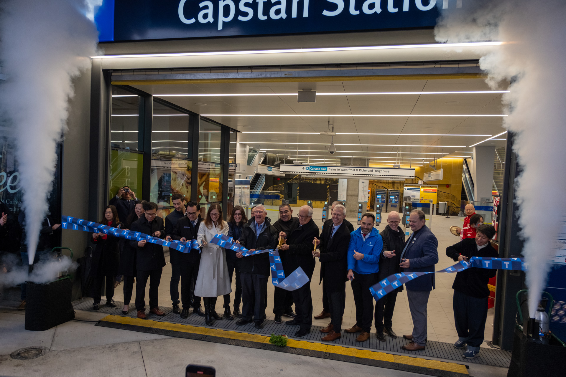 Delegates cut a large ribbon to signify the opening of Capstan Station