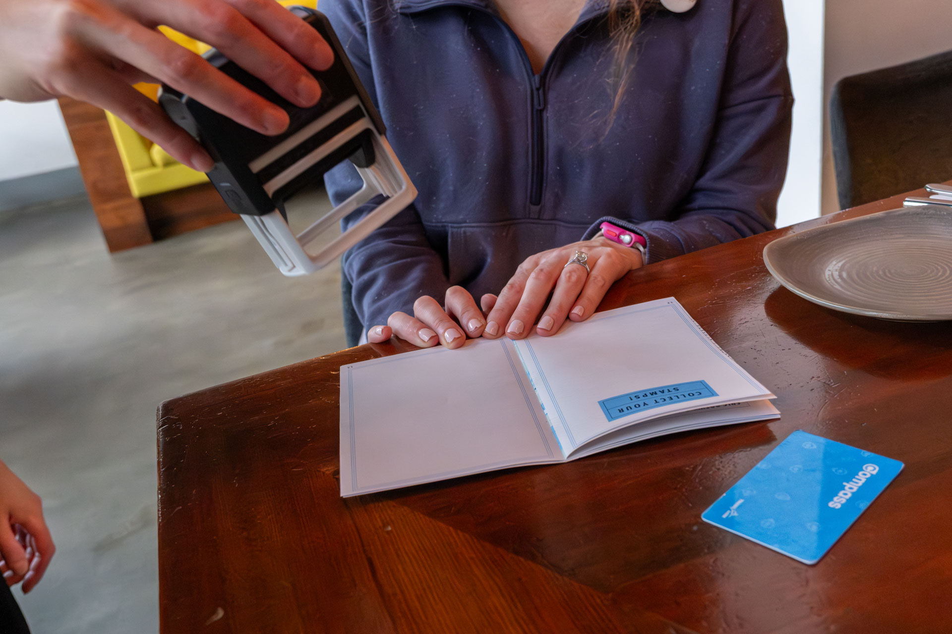 TransLink Passport being stamped at a local restaurant