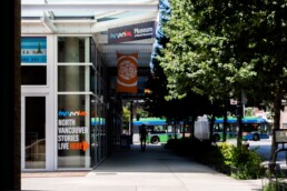 Exterior photo of MONOVA with a RapidBus in the distance