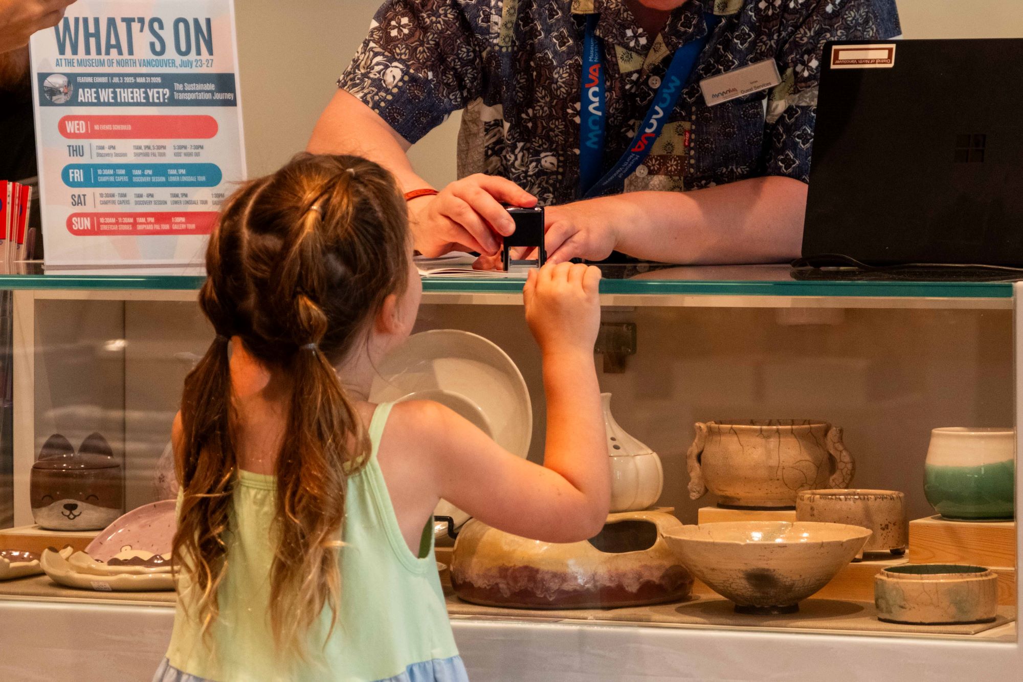 Child gets passport stamped at MONOVA