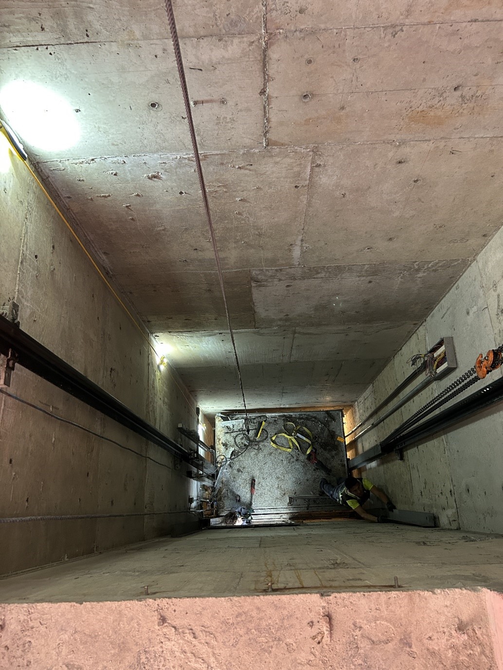 The view looking down into the elevator shaft at 22nd Station