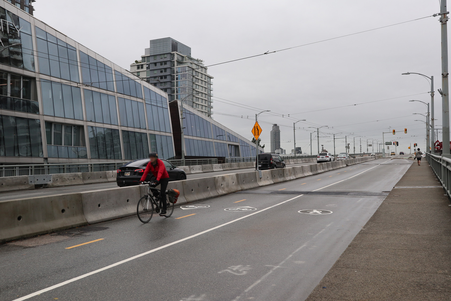 Person cycling northbound on the Granville Connector