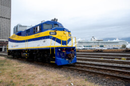 West Coast Express Locomotive number 907 sits outside Waterfront Station