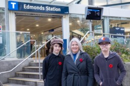 3 customers stand outside Edmonds Station