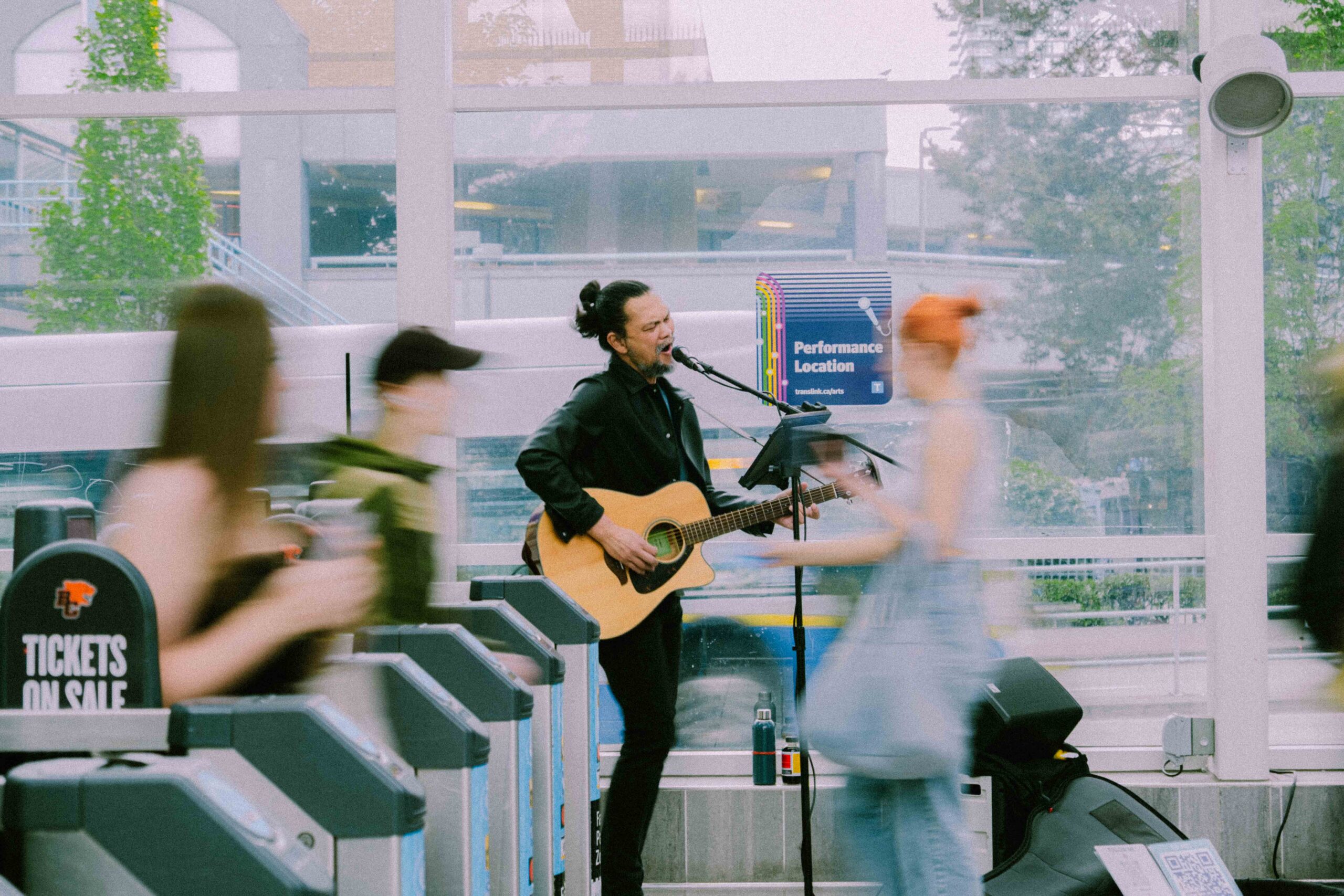 Ian Zafra performing at Metrotown Station