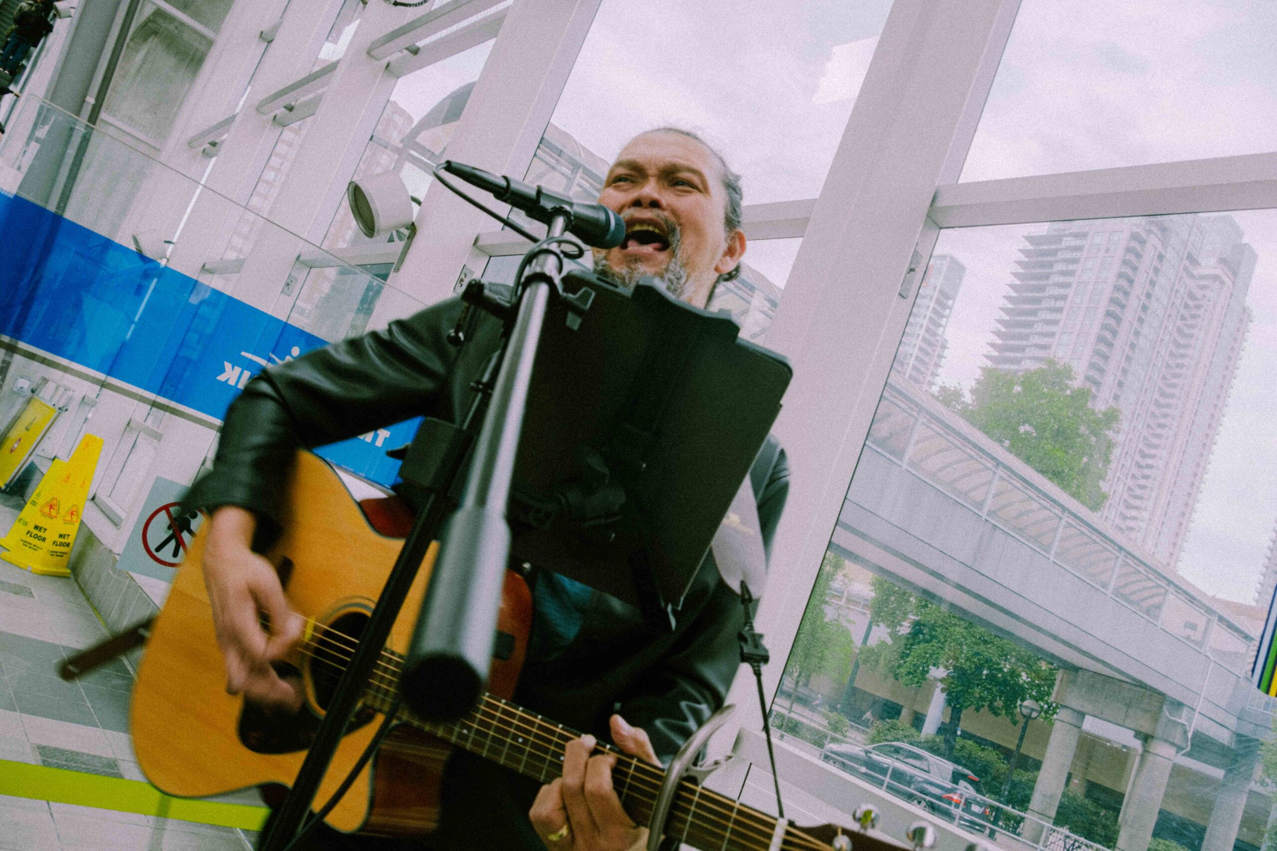Ian Zafra performing at Metrotown Station