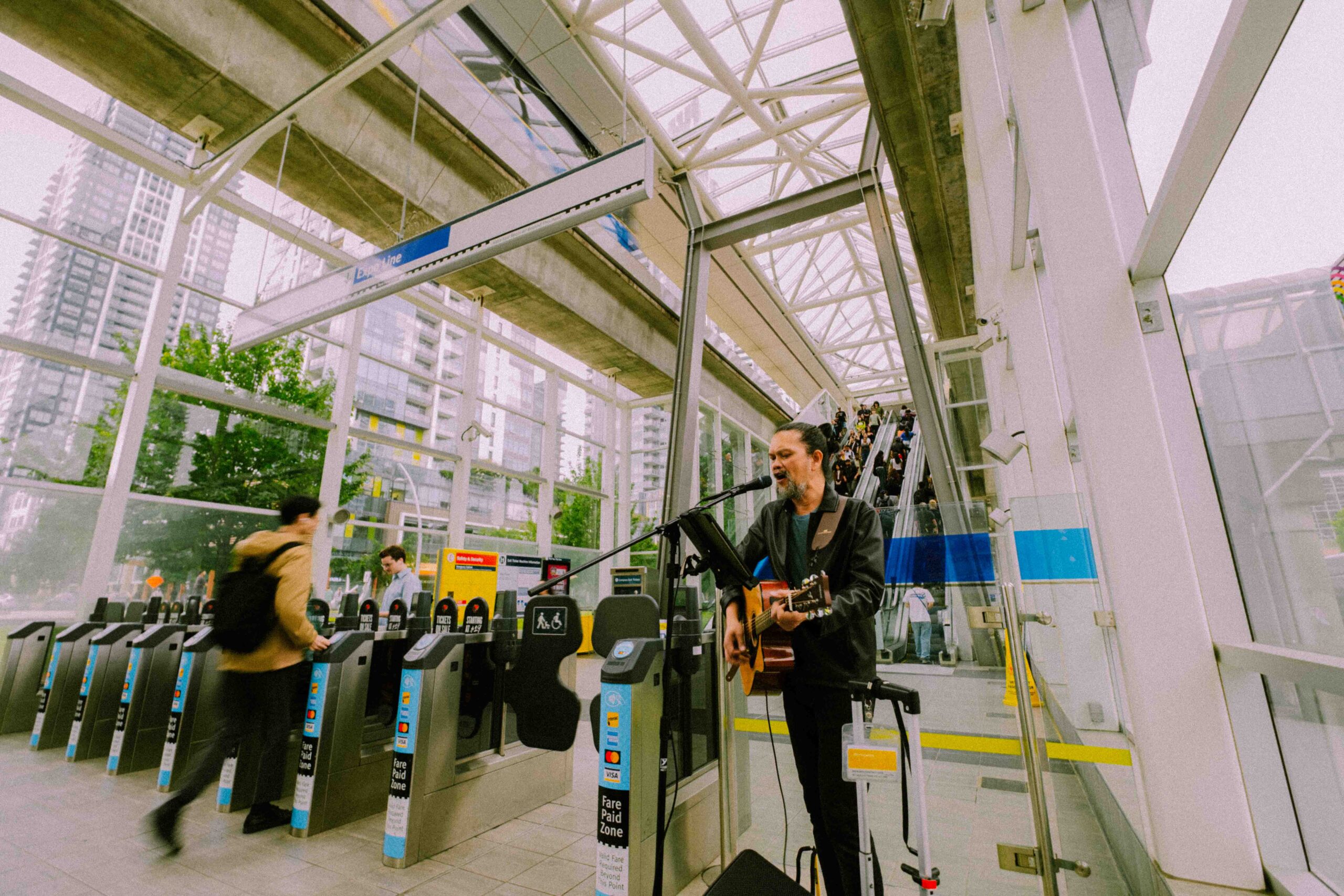 Ian Zafra performing at Metrotown Station