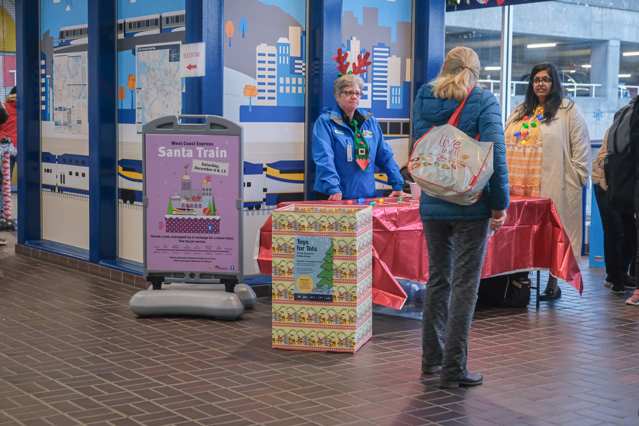 Staff greet customers at the West Coast Express Santa Train