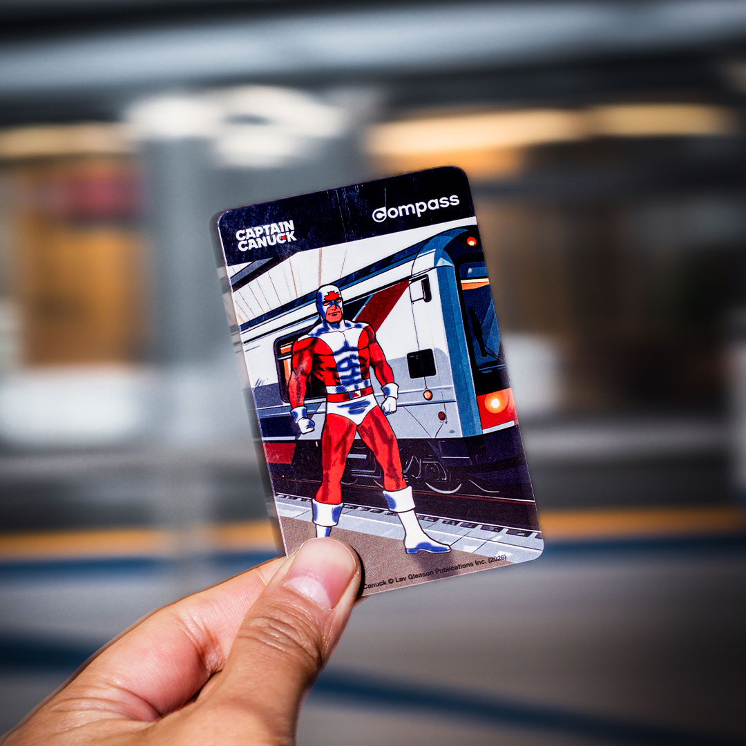 Captain Canuck with Mark I SkyTrain Compass Card