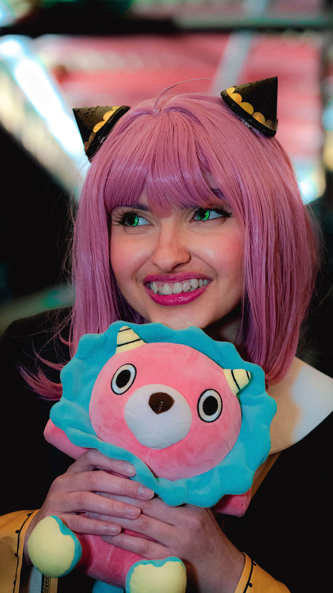 Transit rider and cosplayer dressed as Anya from Spy Family