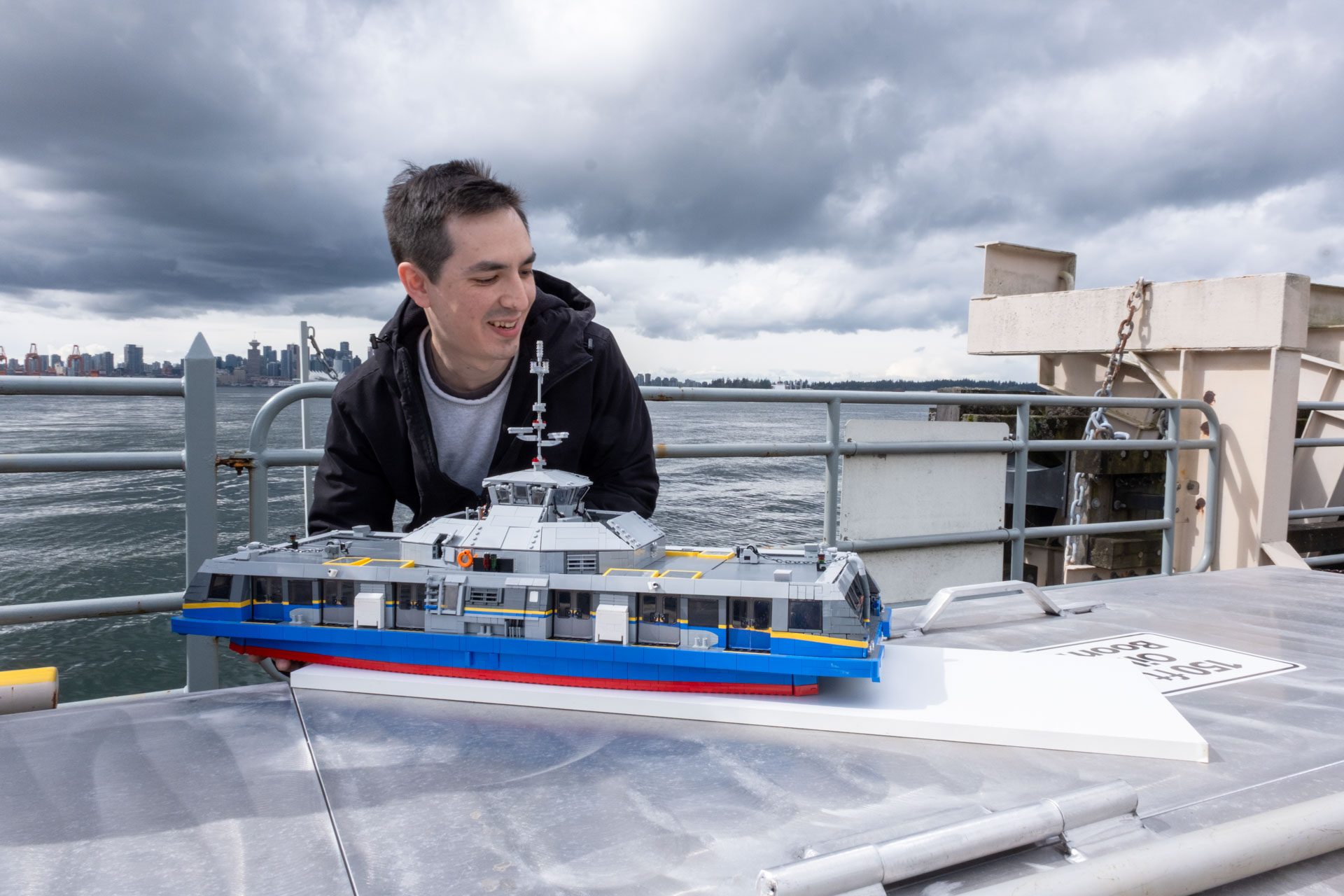 William plays with his SeaBus LEGO