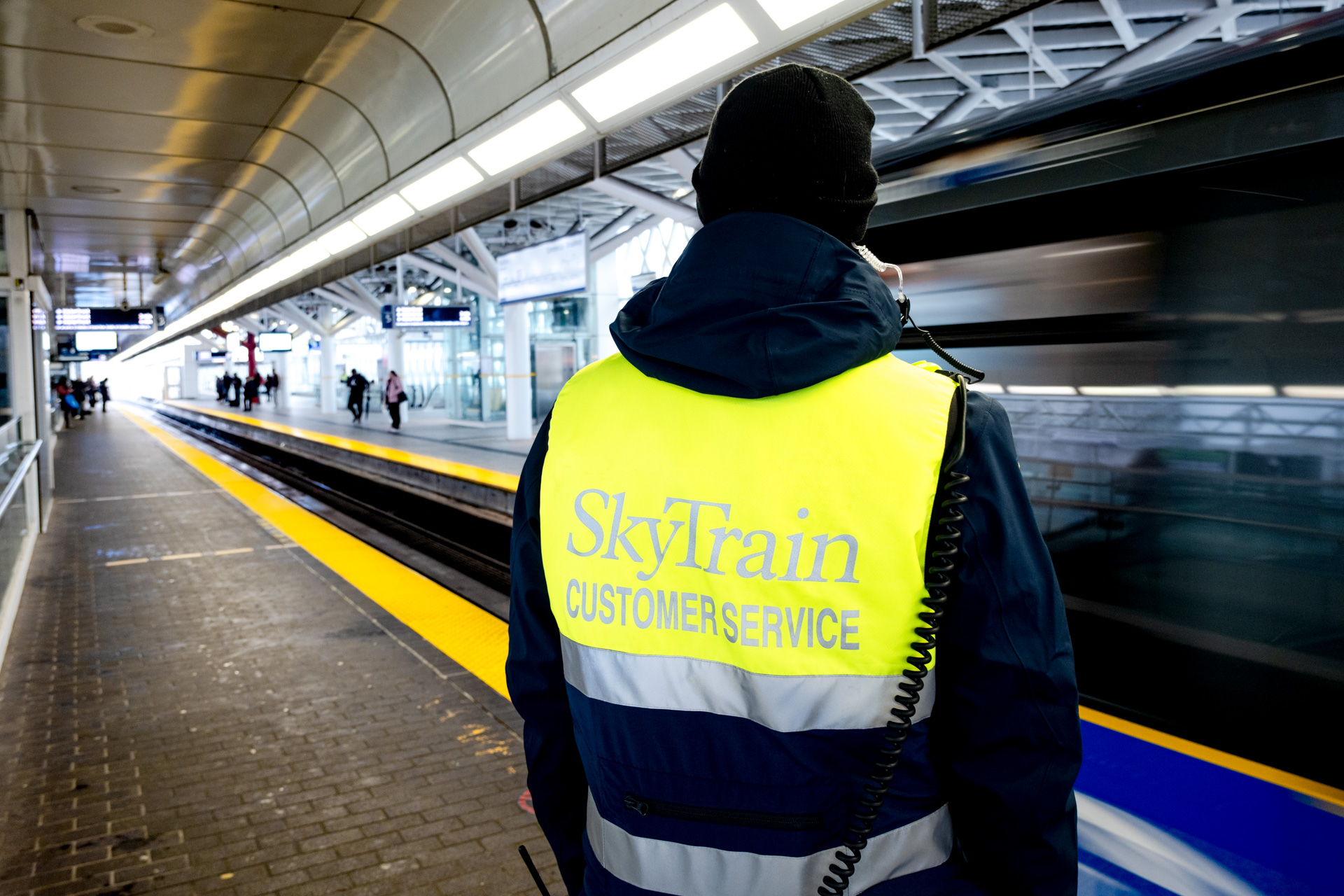 SkyTrain Attendant looks out on the guideway