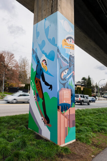“Connections Through Time” by Austin Aan’yas Harry, a SkyTrain pillar artwork showing an eagle, a wolf, and a skateboarder along Stewardson Way.