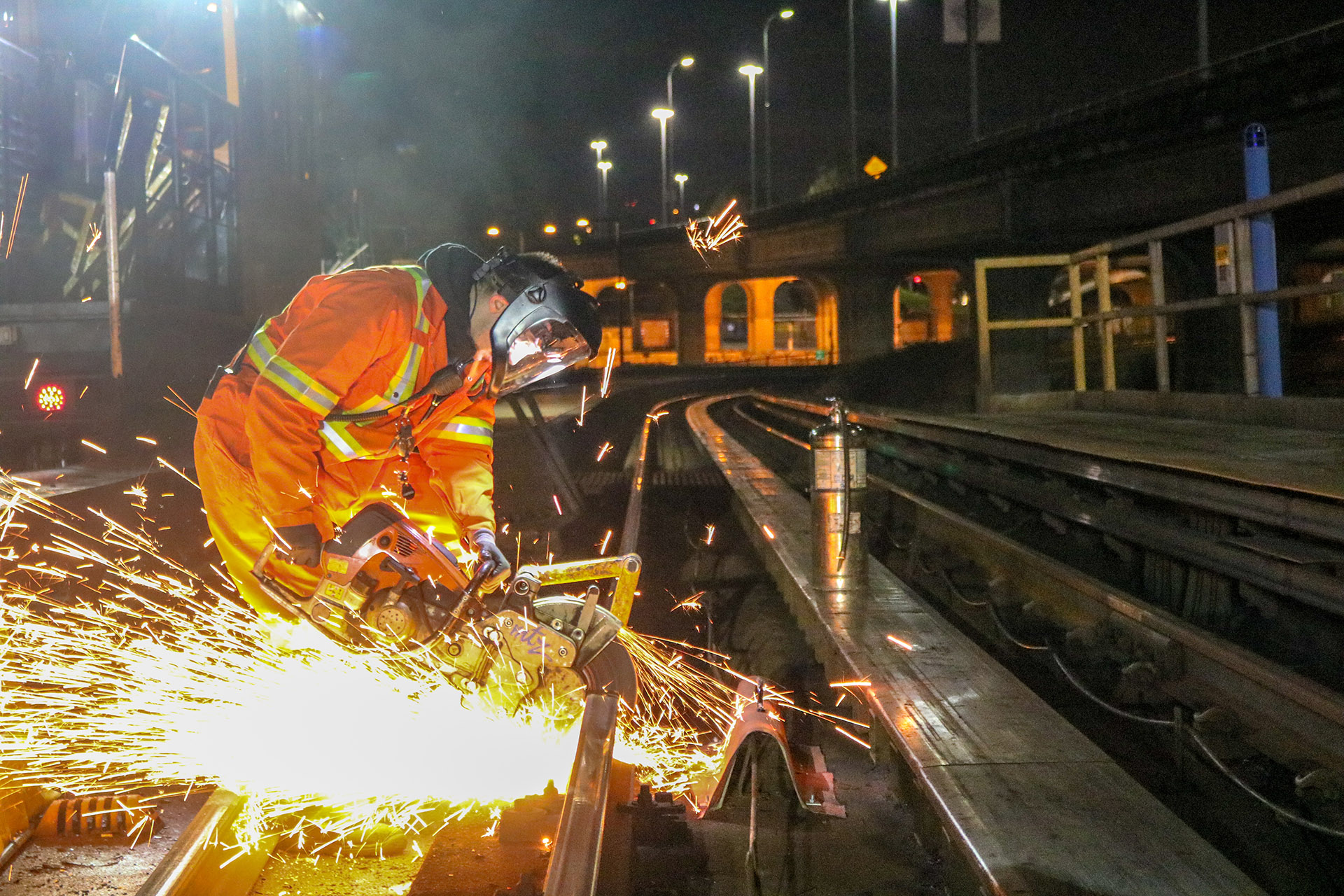 BCRTC staff member cuts a section of running rail