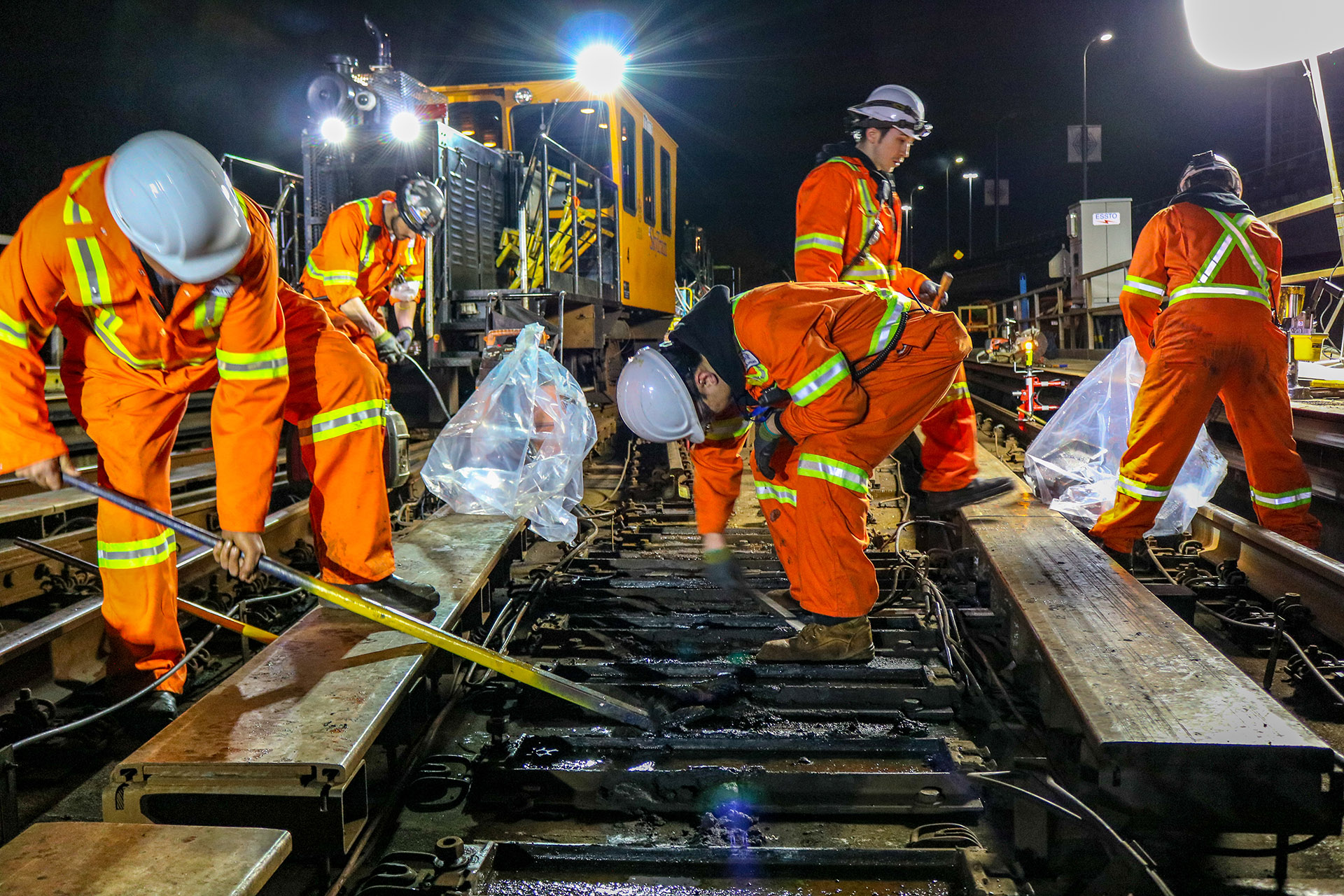 Crews replace an old track switch